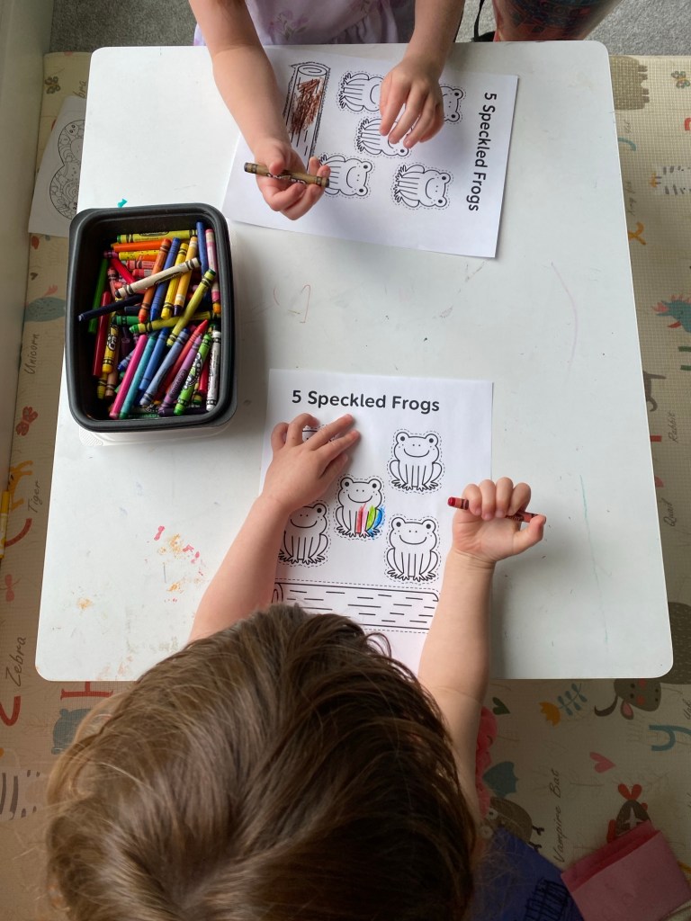 kids coloring 5 speckled frogs activity